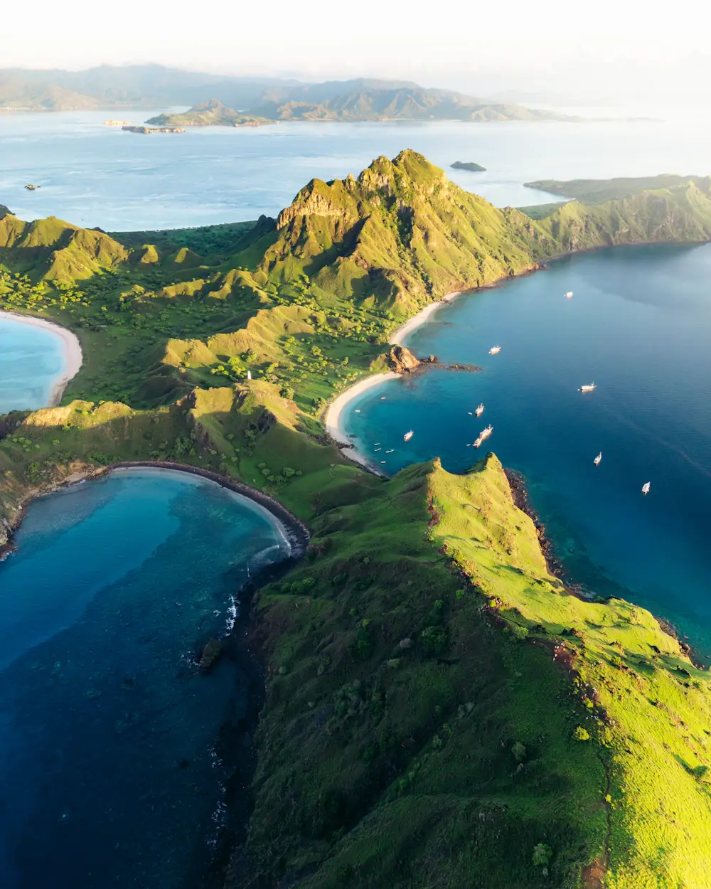 Aerial view of green Komodo islands and turquoise bays