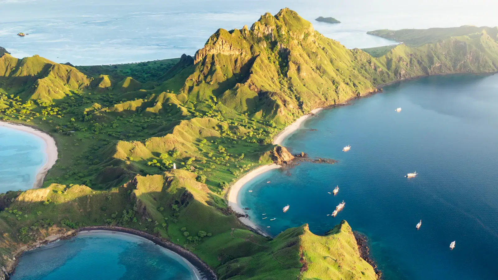 Aerial view of green Komodo islands and turquoise bays