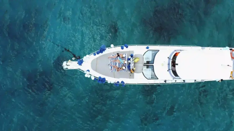Charter boat under way on open blue water
