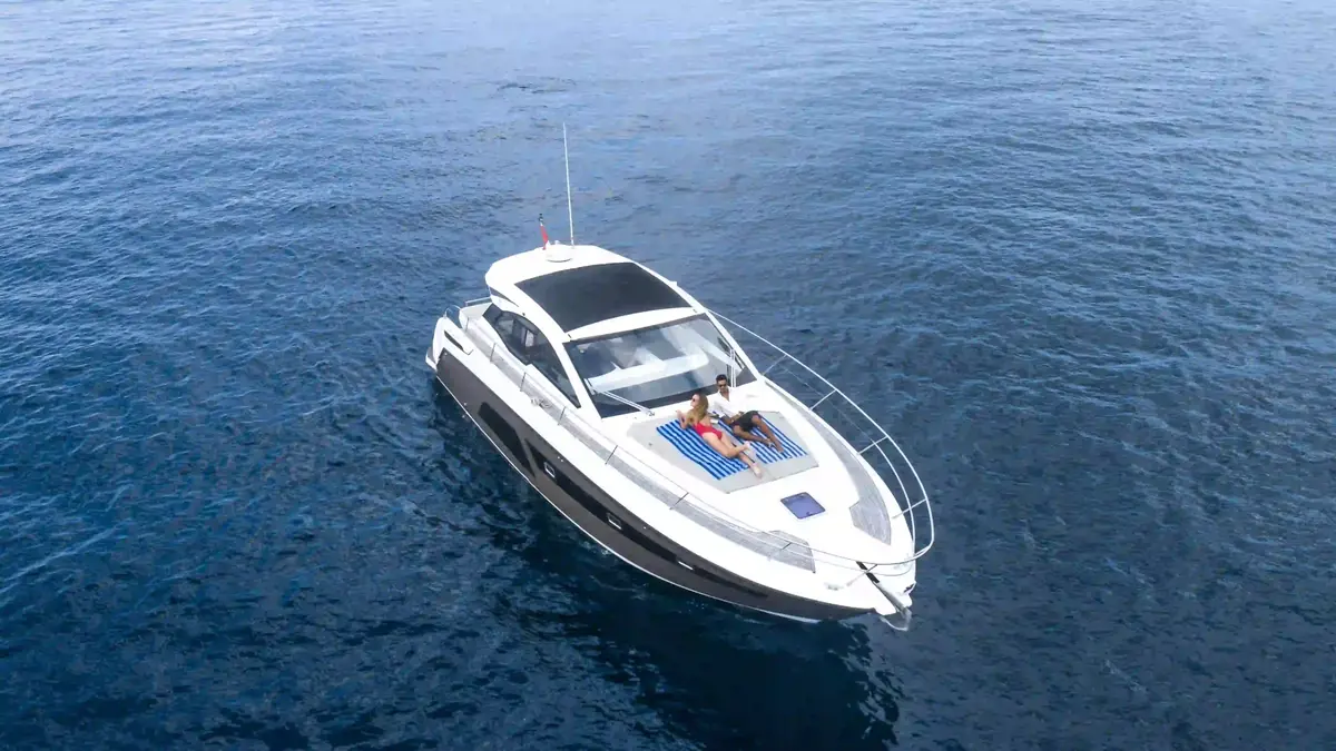 Charter boat under way on open blue water