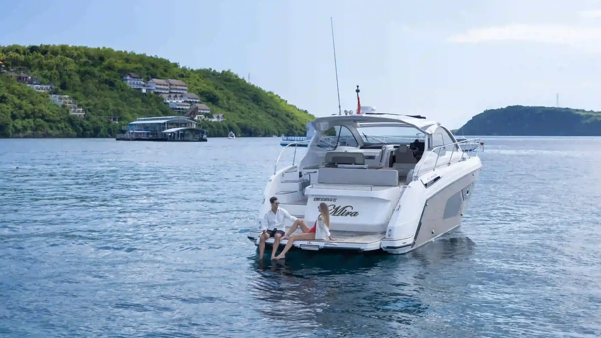 Charter boat under way on open blue water